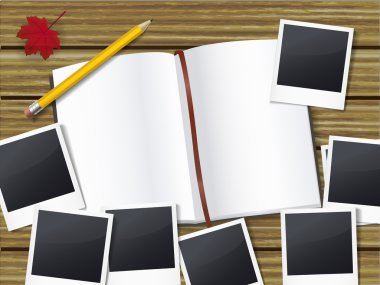 açık defter kalem ve bol bol fotoğraf