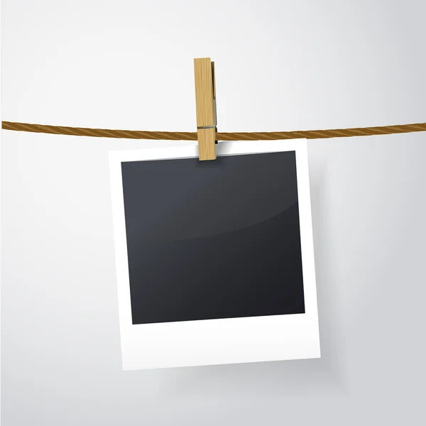 Blank photo frame on rope — Stock Vector