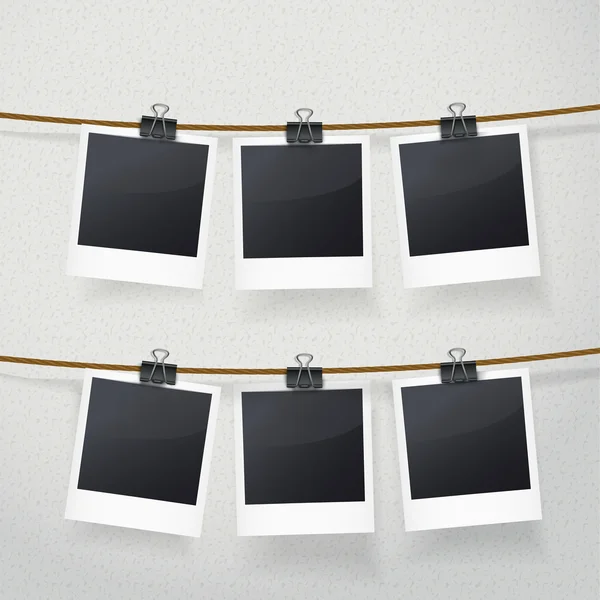 Blank photo frames on rope — Stock Vector