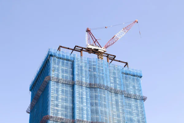 Construction site with tower crane — Stock Photo, Image