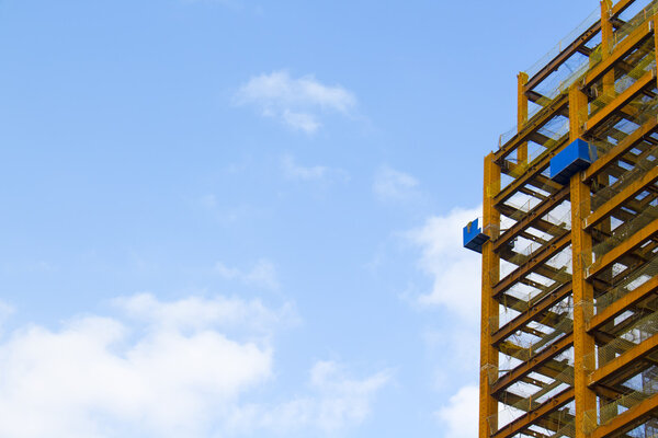 Close up look at construction site over blue sky