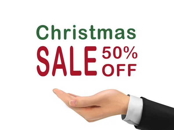 Venta de Navidad 50 por ciento de descuento sosteniendo a mano realista — Vector de stock