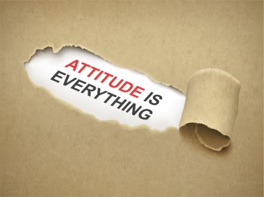 Paper torn to reveal phrase attitude is everything clipart