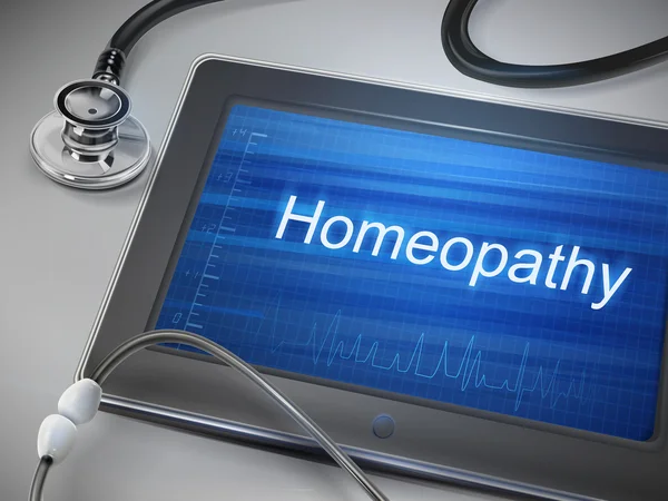 Slovo homeopatie displej tabletu — Stockový vektor
