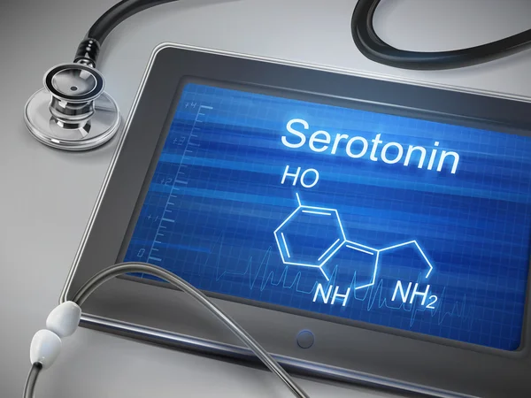 Serotonina słowo wyświetlane na tabletki — Wektor stockowy