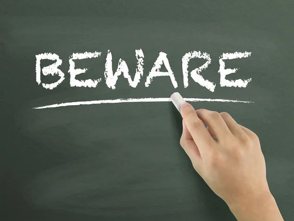 Beware word written by hand — Stock Photo, Image