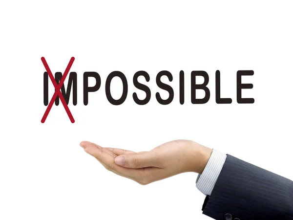 Turning the word impossible into possible by businessman's hand — Stock Photo, Image