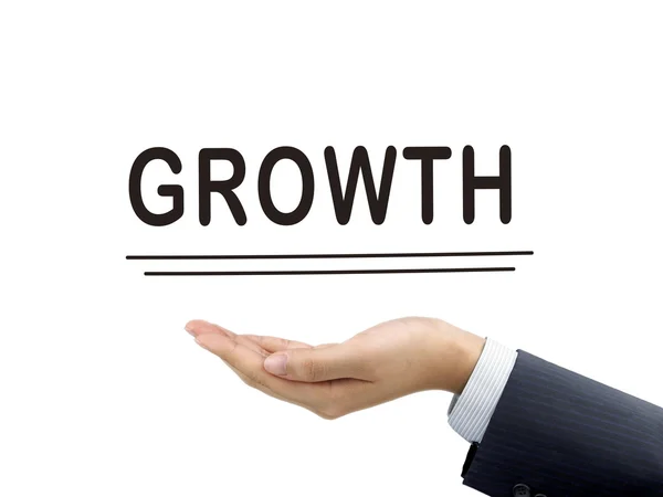 Crescimento palavra segurando pela mão do empresário — Fotografia de Stock