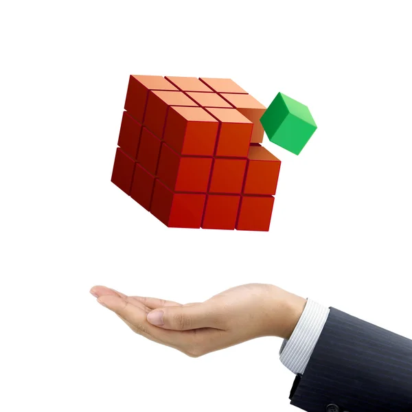 Businessman's hand holding magic cube — Stock Photo, Image