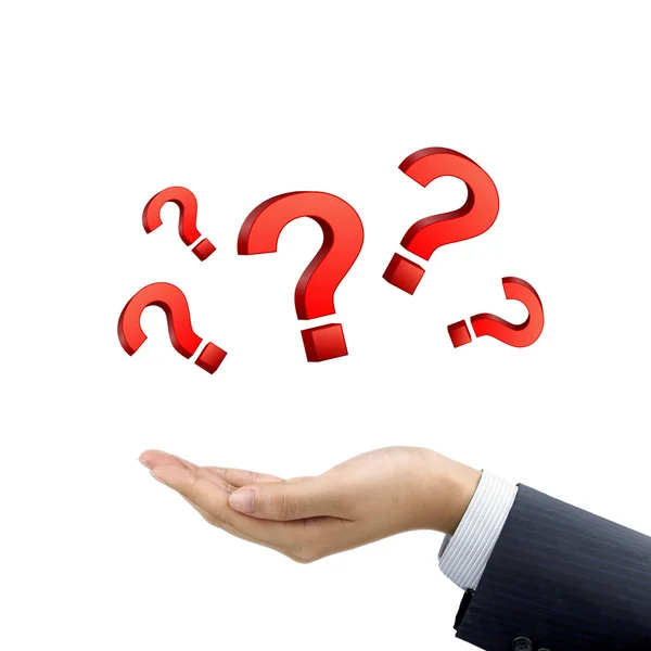 Businessman's hand holding question marks — Stock Photo, Image