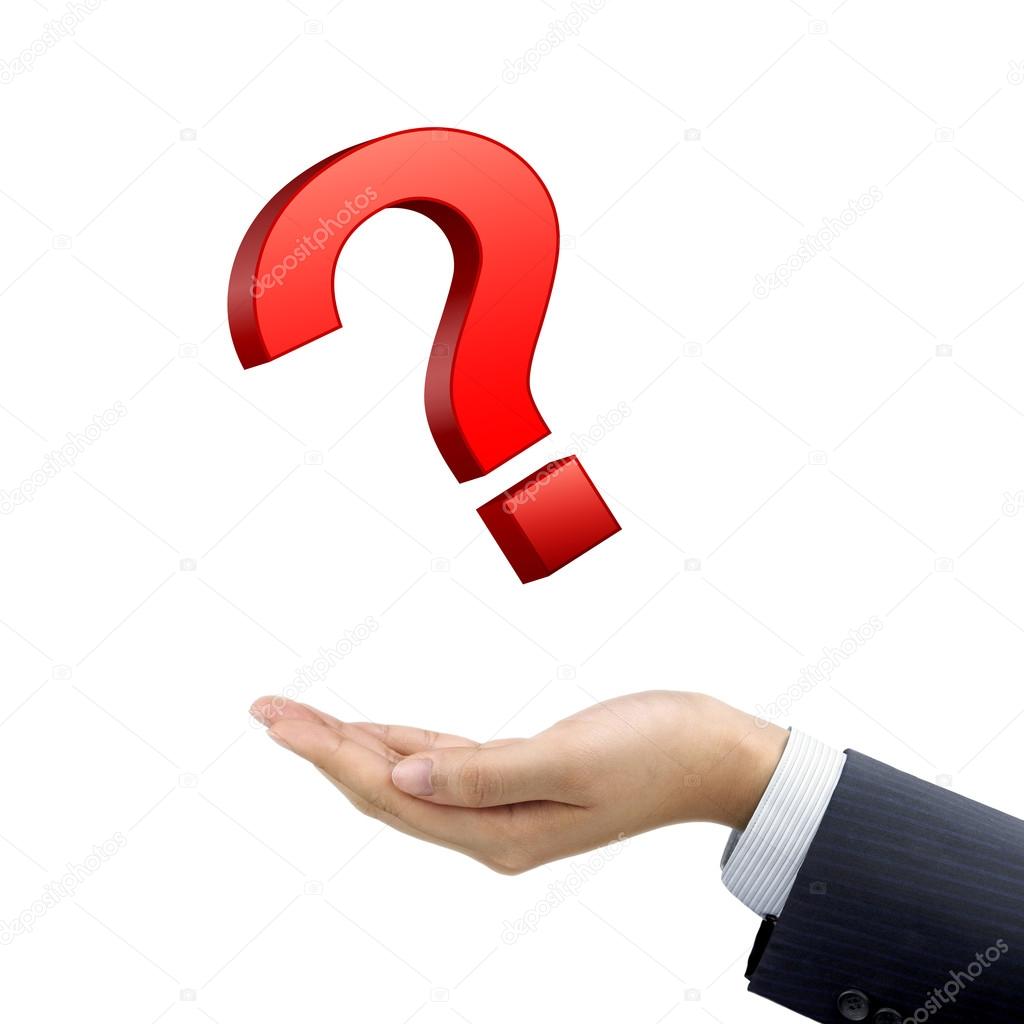 businessman's hand holding question mark