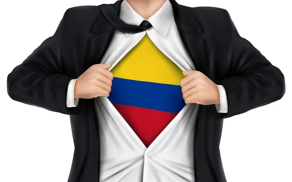 Hombre de negocios mostrando la bandera de Colombia debajo de su camisa — Archivo Imágenes Vectoriales