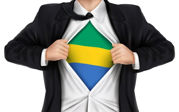 Empresário mostrando a bandeira do Gabão sob sua camisa — Vetor de Stock