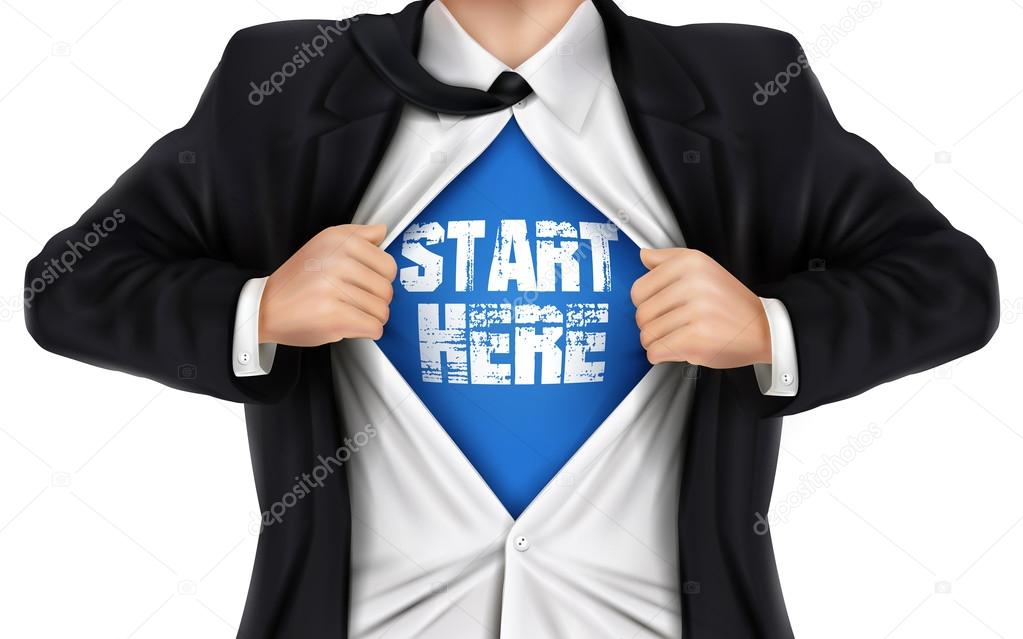 businessman showing Start here words underneath his shirt 