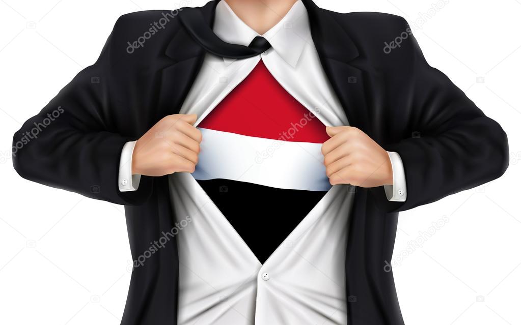 businessman showing Yemen flag underneath his shirt 