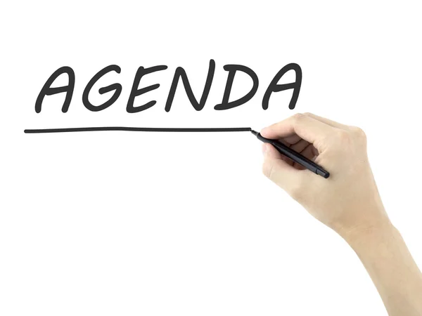 Agenda word written by man's hand — Stock Photo, Image