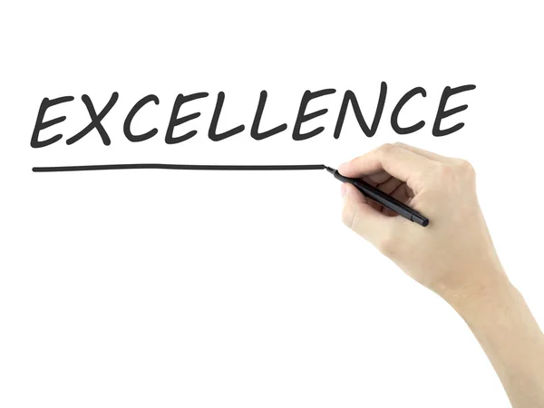 Excellence word written by man's hand — Stock Photo, Image