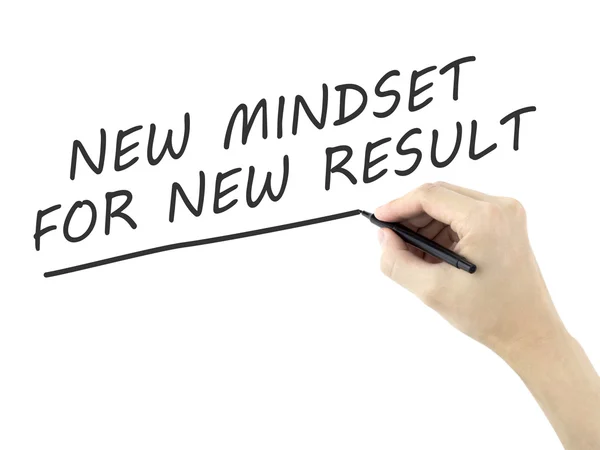 New mindset for new result words written by man 's hand — стоковое фото