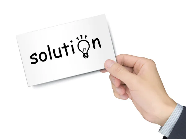 Solution card in hand — Stock Photo, Image