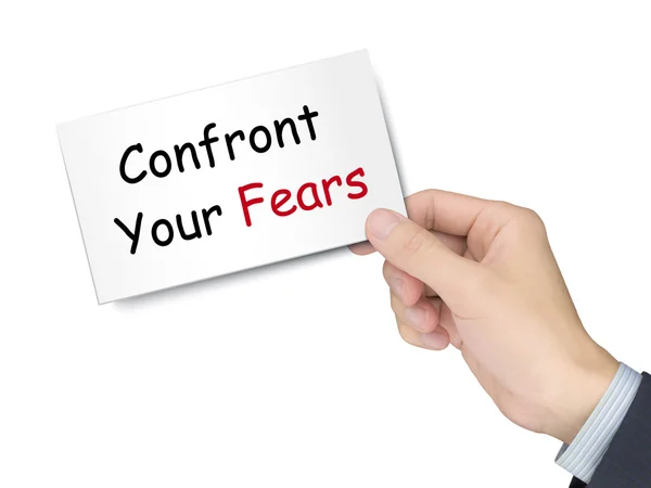Confront your fears card in hand — Stock Photo, Image