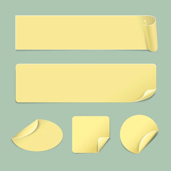 Conjunto de pegatinas amarillas de papel — Vector de stock