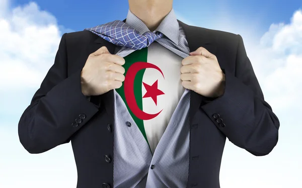 Businessman showing Algeria flag underneath his shirt — Stock Photo, Image