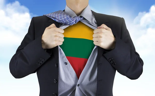 Businessman showing Lithuania flag underneath his shirt — Stock Photo, Image