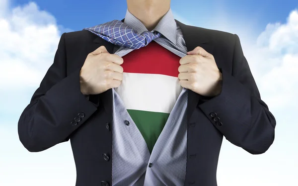 Businessman showing Hungarian flag underneath his shirt — Stock Photo, Image