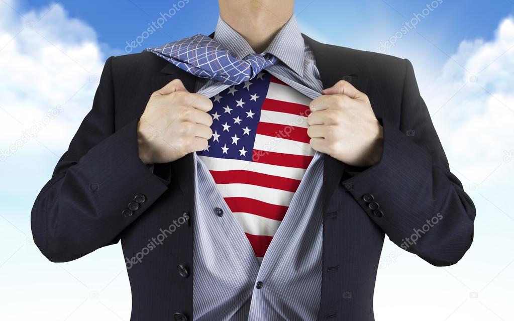 businessman showing American flag underneath his shirt
