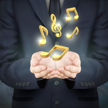 businessman holding golden music notes