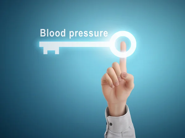 Mão masculina pressionando botão de tecla de pressão arterial — Vetor de Stock