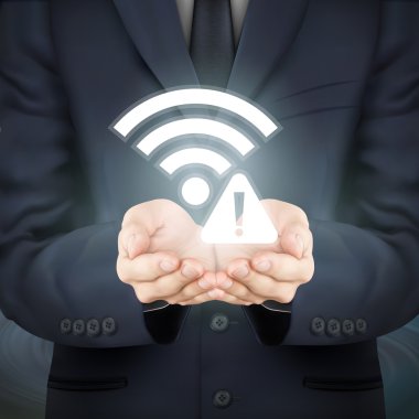 WiFi bağlantı sorunu simgesi tutan işadamı