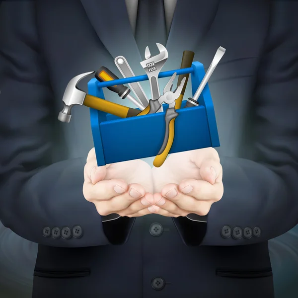 Business man holding tools box — стоковый вектор