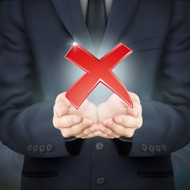 Kızıl Haç işareti tutan işadamı