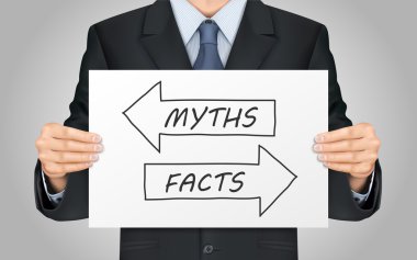 businessman holding myths or facts poster clipart