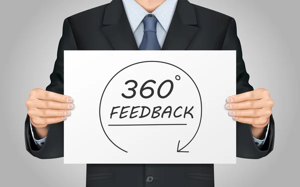 Business man holding 360 feedback content poster — стоковый вектор