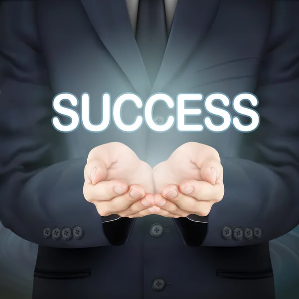 Business man holding success words — стоковый вектор