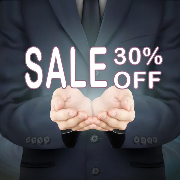 Empresário segurando venda 30 por cento fora palavras — Vetor de Stock