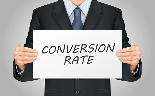 Businessman holding conversion rate words poster — Stock Vector