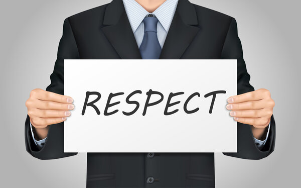 бизнесмен, держащий плакат с уважением
