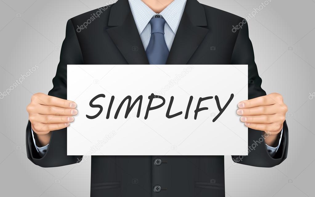 businessman holding simplify word poster