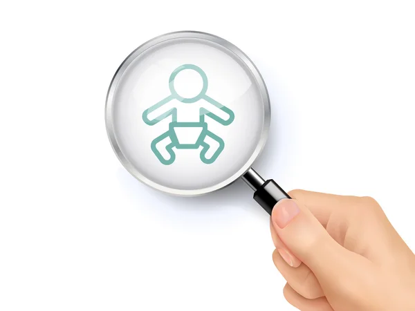 Baby icon showing through magnifying glass held by hand — Stock Vector