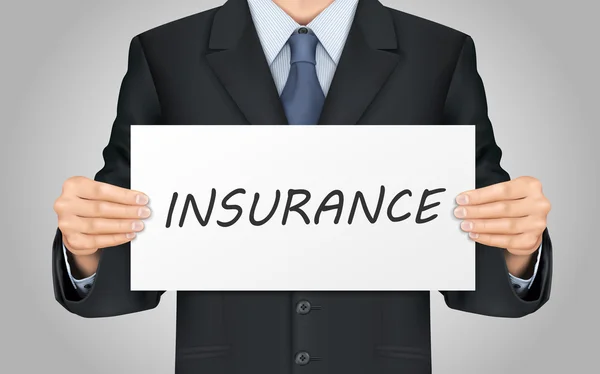 Empresário segurando cartaz de seguro —  Vetores de Stock