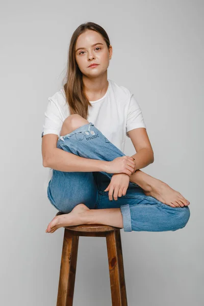 Model Tests Beautiful Girl Long Hair Sitting Chair Posing — Stock Photo, Image