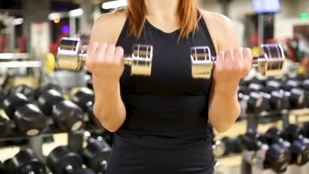 Sporty Girl Doing Biceps Exercise Dumbbells — Stock Video