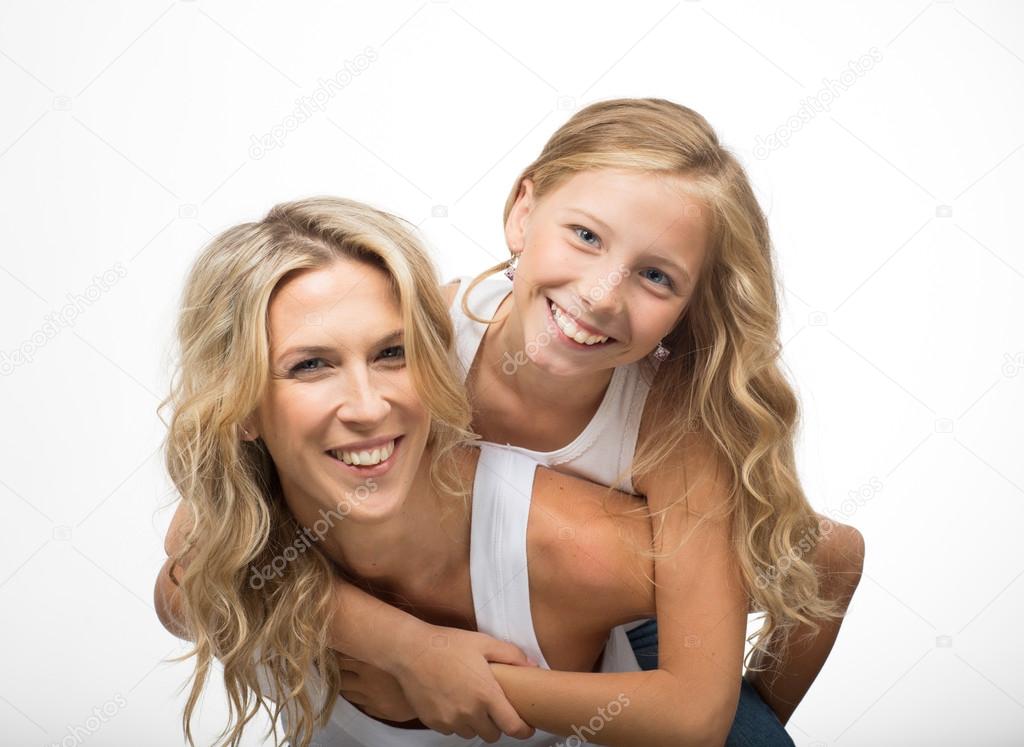 Beautiful laughing mother and child play together