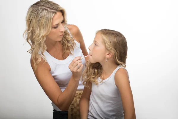 Family make-up, blonde mother and daughter together — Stock Fotó