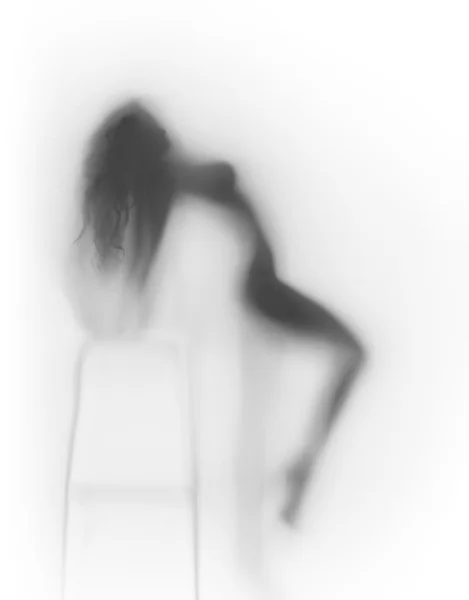 Silhouette de corps de femme très sexy derrière un mur de verre — Photo