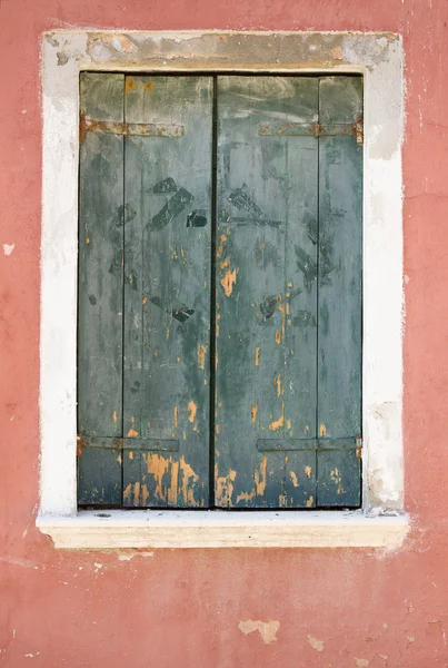 Green wooden window cover of an old house — Stock Photo, Image