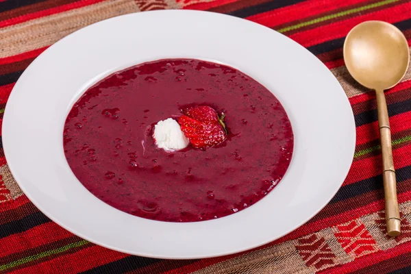 Blueberry strawberry soup with fruit and ice cream — Stock Photo, Image